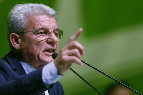 Sefik Dzaferovic, presidential candidate of Bosnian Muslim ruling part &quot;Party of Democratic Action&quot; (SDA), addresses supporter during the final campaign rally in Sarajevo, Bosnia, Friday, Oc ...