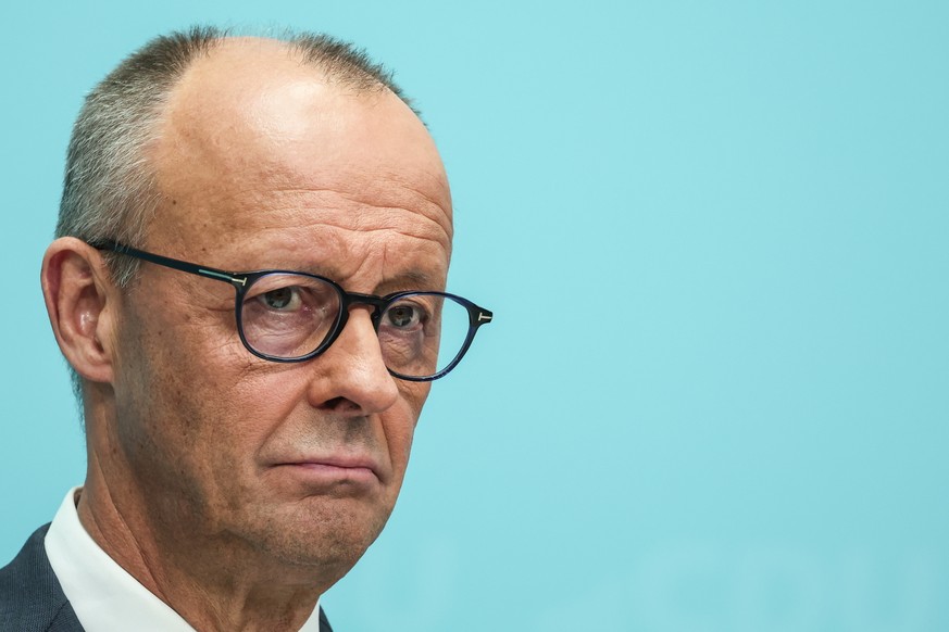 epa13254231 German Chancellor and leader of the Christian Democratic Union (CDU) Friedrich Merz attends a press conference at CDU party's headquaters after a CDU party board meeting in Berlin, Ge ...