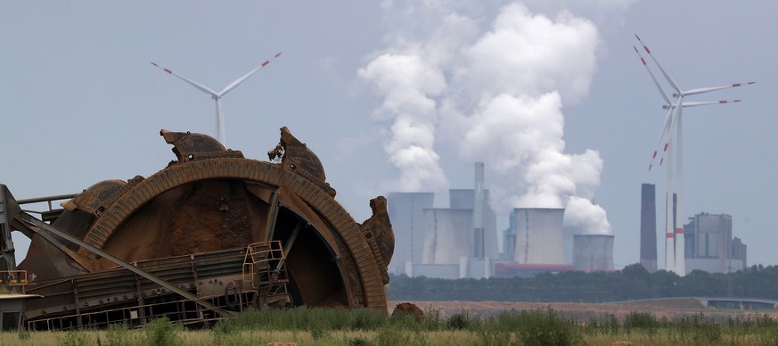 epa08132469 (FILE) - A bucket wheel excavator operates to dig brown coal at the Garzweiler lignite opencast mine operated by RWE in Erkelenz near Cologne, 20 June 2019 (reissued 16 January 2020). Acco ...