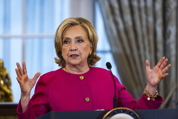 epa10884765 Former Secretary of State Hillary Clinton speaks ahead of the unveiling of her official portrait at the State Department in Washington, DC, 26 September 2023. Former President Bill Clinton ...