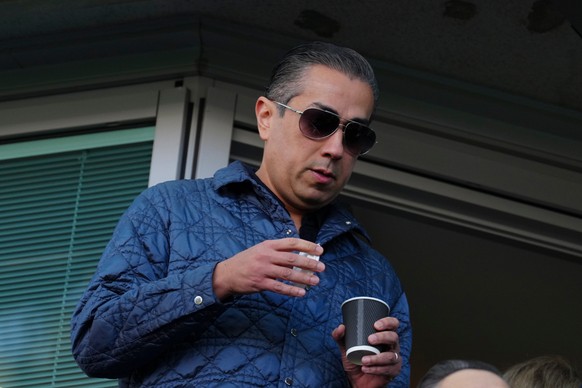 FILE - Chelsea co-owner Behdad Eghbali watches before the start of the English Premier League soccer match between Chelsea and Newcastle at Stamford Bridge in London, Oct. 27, 2024. (AP Photo/Dave Sho ...
