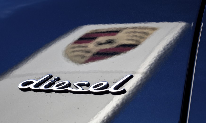 FILE -- In this Wednesday, Nov. 4, 2015 photo the word &#039;Diesel&#039; and the logo of the German car manufacturer Porsche is pictured in Stuttgart, Germany. Porsche&#039;s chief executive Oliver B ...