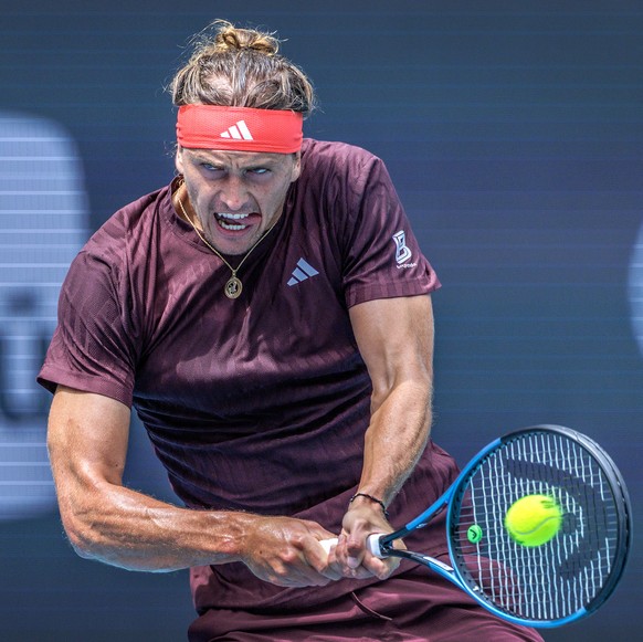 epa11985669 Alexander Zverev of Germany in action against Jordan Thompson of Australia during their Men?s Singles round of 32 tennis match at the 2025 Miami Open tennis tournament, in Miami, Florida,  ...