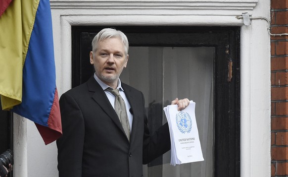 epa05714696 (FILE) - Julian Assange speaks to the media from a balcony of the Ecuadorian Embassy in London, Britain, 05 February 2016 (reissued 13 January 2017). According to a Wikleaks statement publ ...