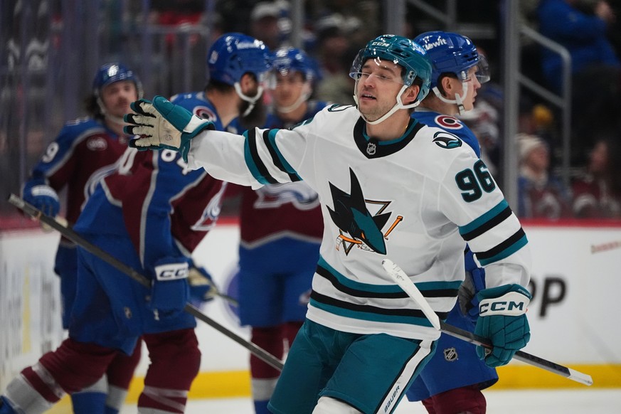 San Jose Sharks center Philipp Kurashev celebrates after scoring a goal against the Colorado Avalanche in the third period of an NHL hockey game Wednesday, Feb. 4, 2026, in Denver. (AP Photo/David Zal ...