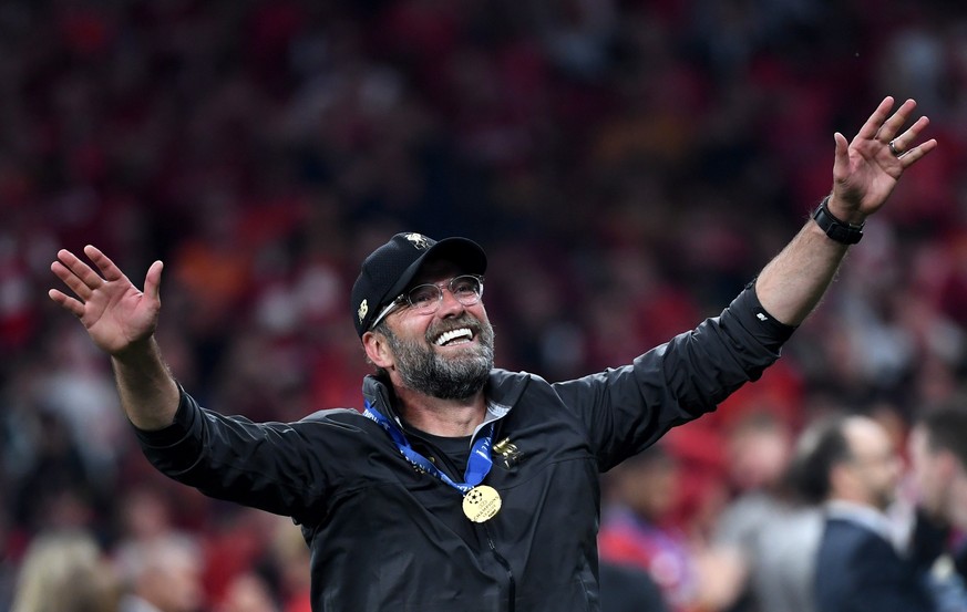 epa07619156 Liverpool&#039;s head coach Juergen Klopp celebrates after winning the UEFA Champions League final between Tottenham Hotspur and Liverpool FC at the Wanda Metropolitano stadium in Madrid,  ...