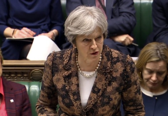 Britain&#039;s Prime Minister Theresa May speaks in the House of Commons in London, Monday, March 12, 2018. British Prime Minister Theresa May says her government has concluded it is &quot;highly like ...