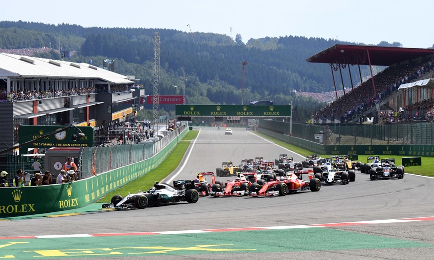 Mercedes driver Nico Rosberg of Germany leads the field into the first corner the start of the Belgian Formula One Grand Prix in Spa-Francorchamps, Belgium, Sunday, Aug. 28, 2016. (AP Photo/Geert Vand ...