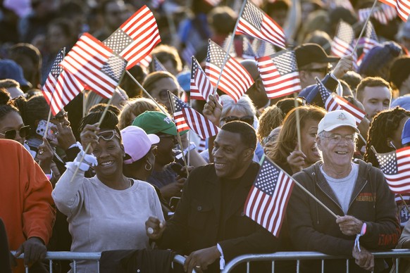 epa11691520 Supporters of US Vice President and current Democratic presidential nominee Kamala Harris wait to hear her speak during her &#039;closing arguments&#039; rally on the Ellipse in Washington ...