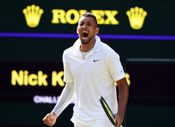 epa07695169 Nick Kyrgios of Australia scores against Rafael Nadal of Spain in their second round match during the Wimbledon Championships at the All England Lawn Tennis Club, in London, Britain, 04 Ju ...