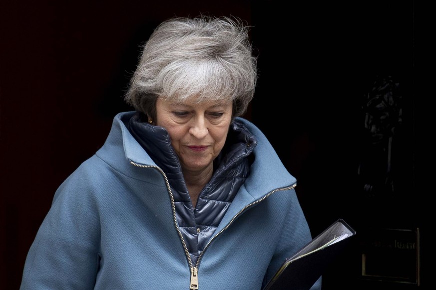 epa07364231 British Prime Minister Theresa May leaves Downing Street, central London, Britain, 12 February 2019. Theresa May is due to give a statement in the House of Commons later in the day to upda ...