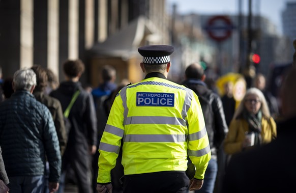 epa10281208 A police officer patrols in Westminster, London, Britain, 02 November 2022. Vetting failures led to people being employed as police officers despite having criminal records, being suspecte ...