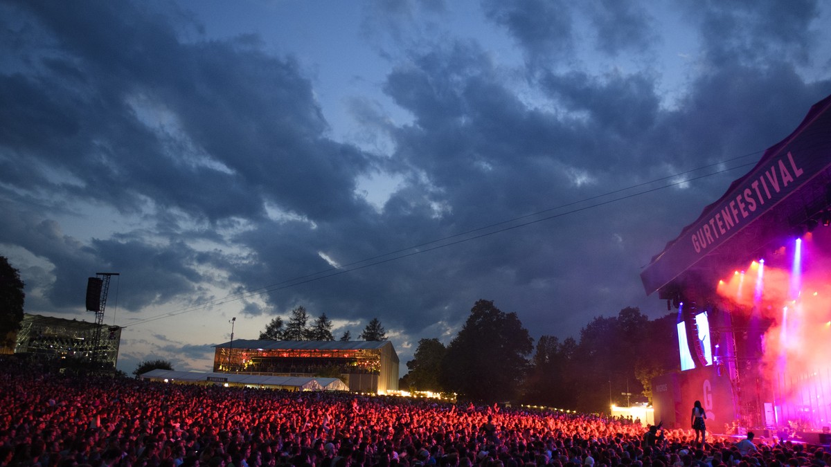 Festival-goers enjoy the concert of the English 'Alt-J' on the Main Stage during the 35th edition of the Gurten music open air festival in Bern, Switzerland, this Friday, July 13, 2018. The  ...