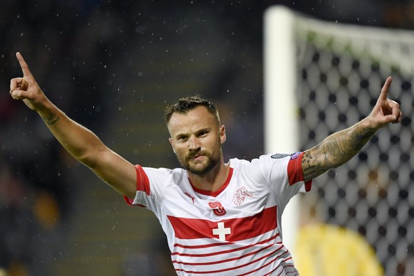 Swiss forward Haris Seferovic, celebrates after scoring the goal to the 0:1 during the 2018 Fifa World Cup group B qualifying soccer match Latvia against Switzerland at Skonto Stadium, in Riga, Latvia ...