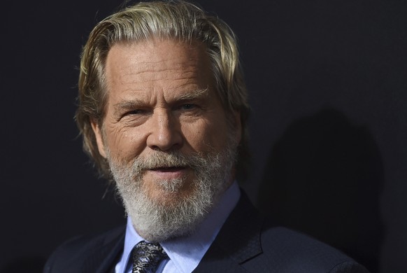 File-This Sept. 22, 2018, file photo shows cast member Jeff Bridges arriving at the Los Angeles premiere of &quot;Bad Times at the El Royale&quot; at TCL Chinese Theatre. Bridges says he is being trea ...