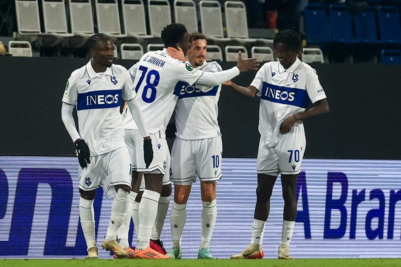 epa12758668 Players of Lausanne celebrate scoring the 0-1 goal during the UEFA Conference League play-offs 1st leg match between SK Sigma Olomouc and FC Lausanne-Sport, in Olomouc, Czechia, 19 Febuary ...