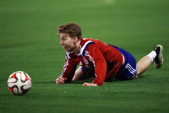 DOHA, QATAR - JANUARY 15: Mitchell Weiser reacts during day 7 of the Bayern Muenchen training camp at ASPIRE Academy for Sports Excellence on January 15, 2015 in Doha, Qatar. (Photo by Alex Grimm/Bong ...