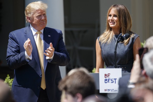 epa07554096 US President Donald J. Trump (L) and First Lady Melania Trump (R) participate in the first anniversary ceremony of the First Lady&#039;s Be Best campaign in the Rose Garden of the White Ho ...
