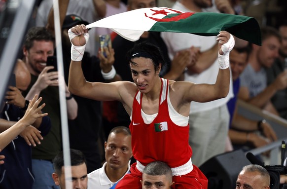 epa11541276 Imane Khelif of Algeria celebrates winning against Yang Liu of China their Women&#039;s 66kg Final bout of the Boxing competitions in the Paris 2024 Olympic Games, at Roland Garros in Pari ...