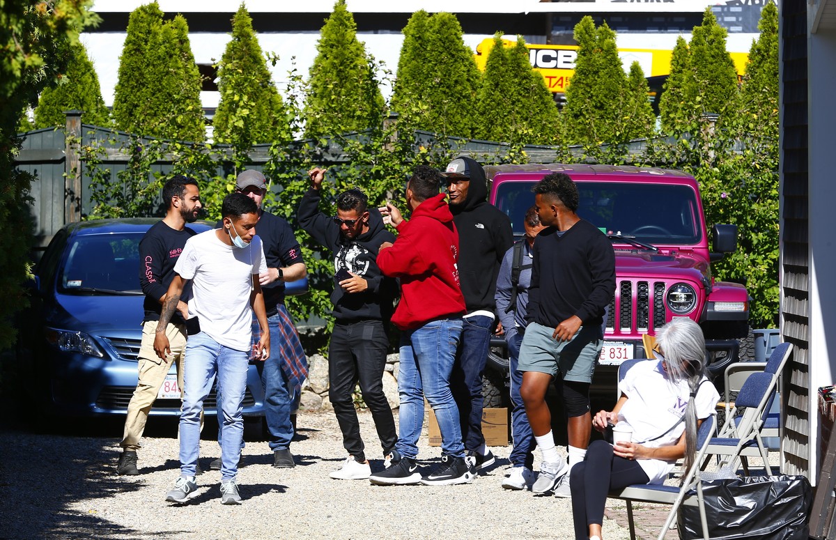 epa10186704 Members of a group of nearly 50 migrants from Venezuela who were flown to the island of Martha's Vineyard off Cape Cod, Massachusetts on 14 September at the parish house at St. Andrew ...