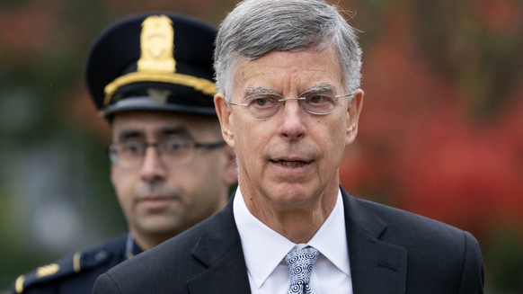 Ambassador William Taylor is escorted by U.S. Capitol Police as he arrives to testify before House committees as part of the Democrats&#039; impeachment investigation of President Donald Trump, at the ...