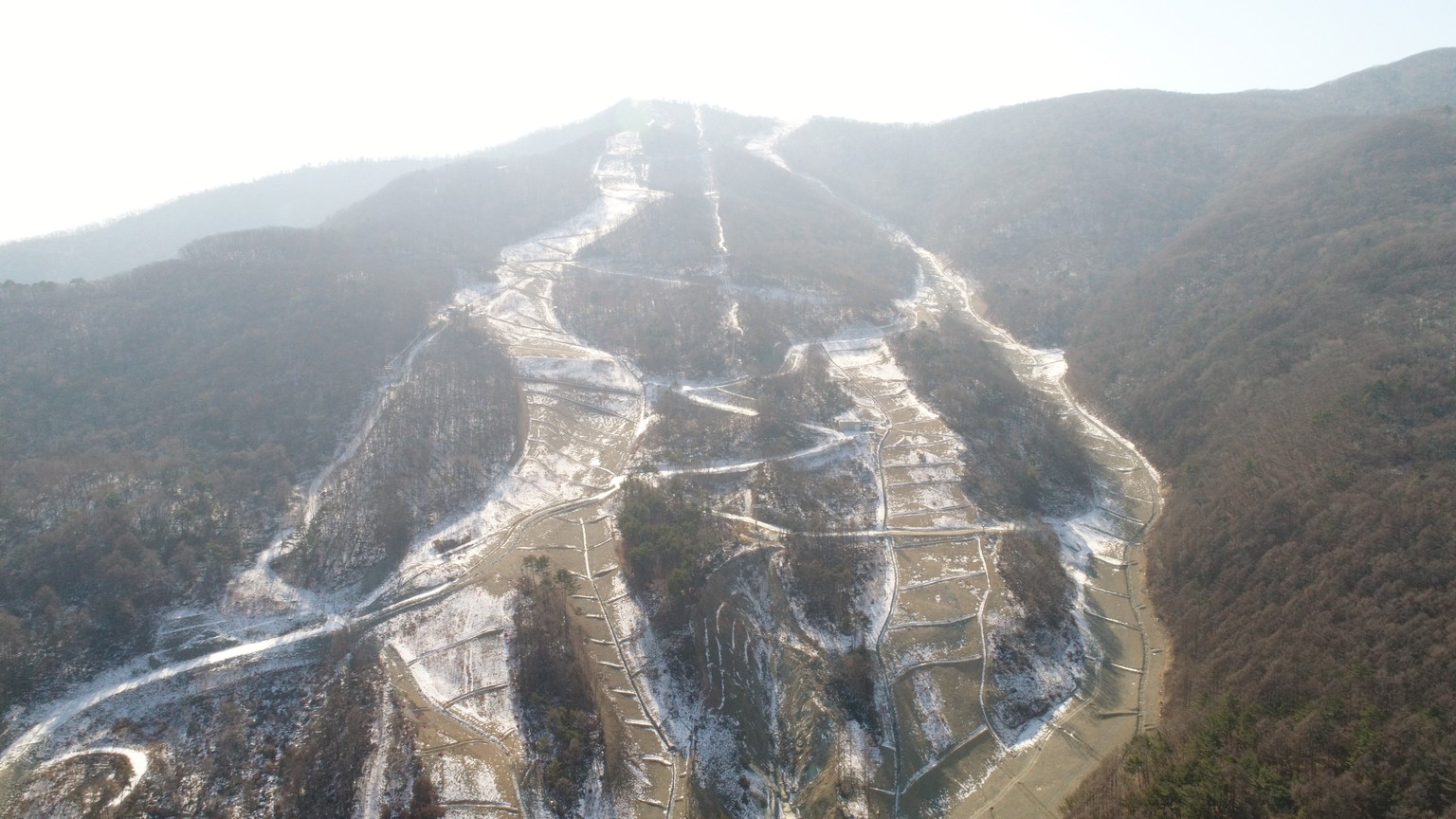 epa07315174 Picture taken with a drone shows the Jeongseon Alpine venue which hosted the Downhill &amp; Super G races of the PyeongChang Winter Olympic Games 2018, South Korea, 24 January 2019. The Py ...