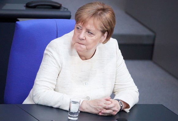 epa06860061 German Chancellor Angela Merkel sits on the government bench during a session of the German parliament Bundestag in Berlin, Germany, 03 July 2018. Members of the German Bundestag discuss a ...