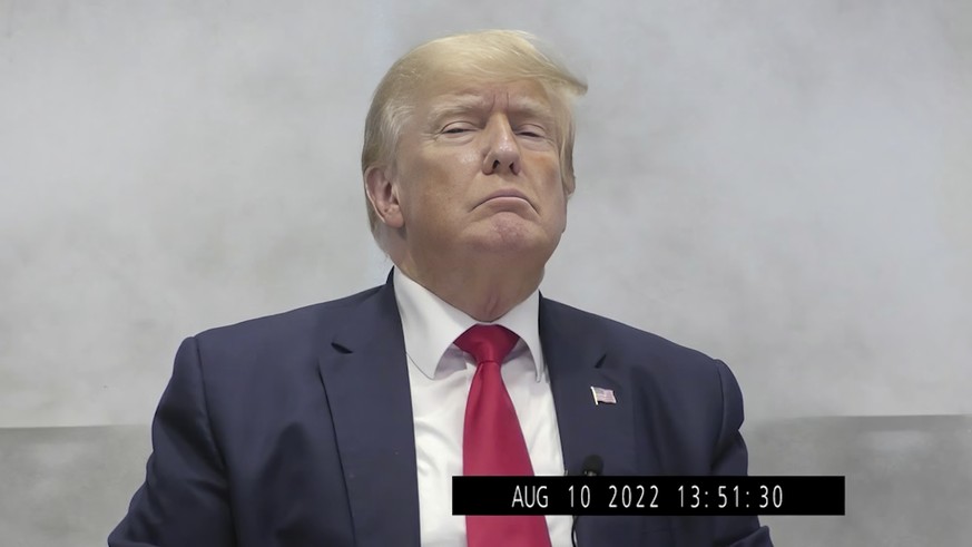 In this image from video provided by the New York State Attorney General, former President Donald Trump listens during an Aug. 10, 2022, deposition, in New York. Trump was deposed as part of state Att ...