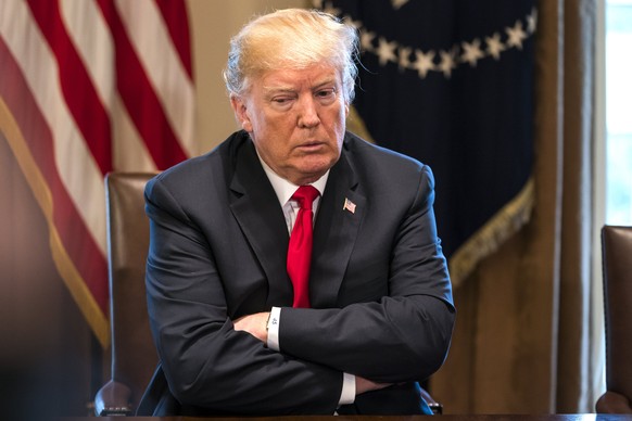 epa06573240 US President Donald J. Trump attends a meeting with leaders from the steel and aluminum manufacturing industries in the cabinet Room of the White House in Washington, DC, USA, 01 March 201 ...