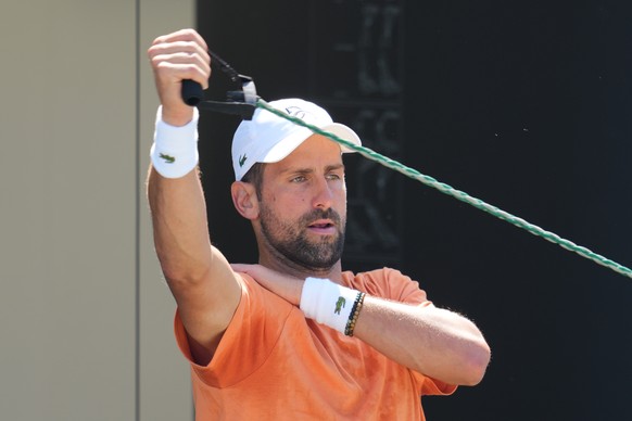 Novak Djokovic or Serbia attends a practice session ahead of the Wimbledon Tennis Championships, in London, Wednesday, June 24, 2026. (AP Photo/Kin Cheung)
Novak Djokovic