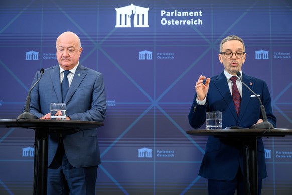epa11821747 Interim OeVP chairman Christian Stocker (L) and Chairman of the Freedom Party of Austria (FPOe) Herbert Kickl (R) speak during the press conference on the coalition talks between the OeVP  ...