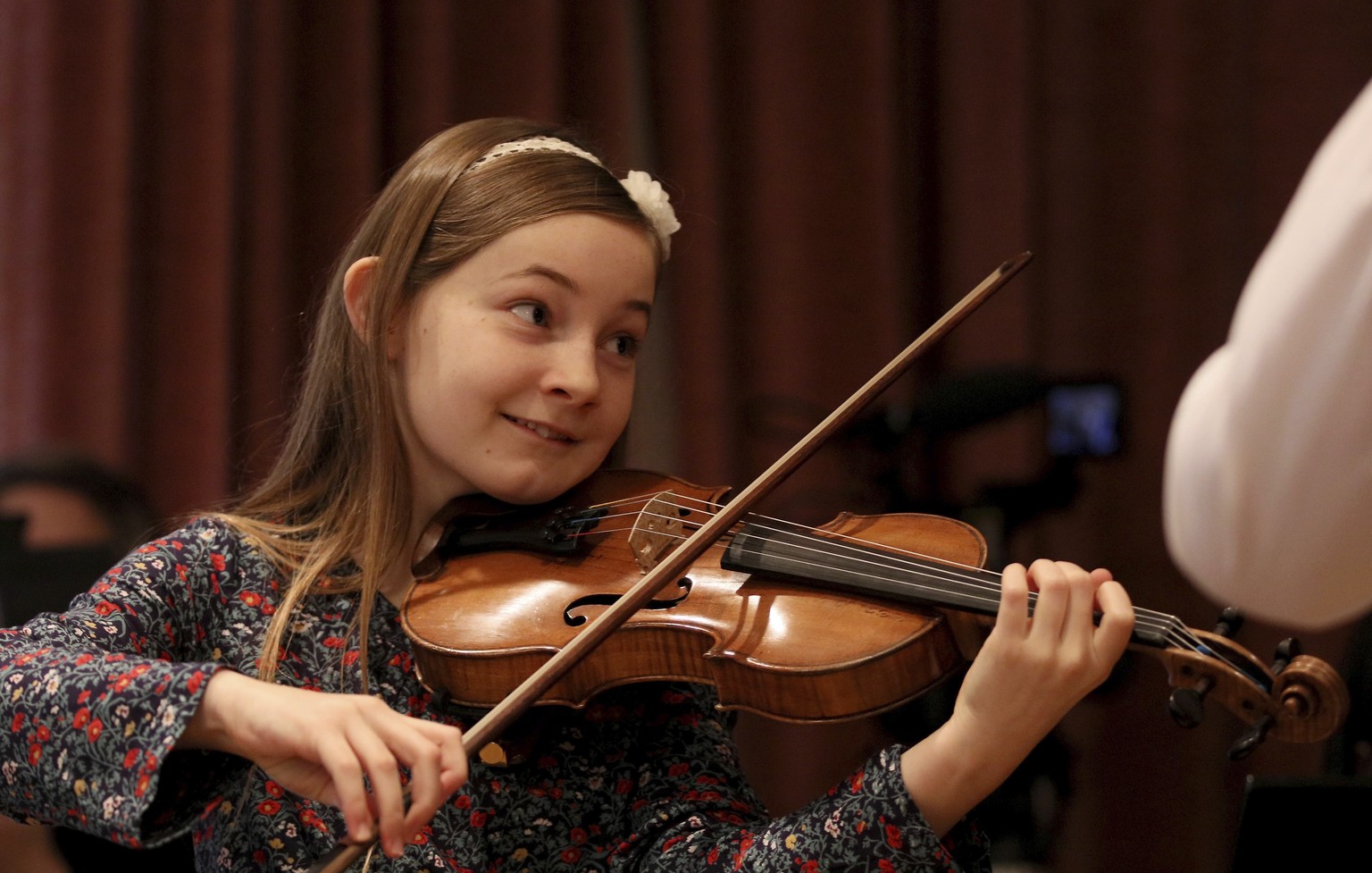 In this Nov. 17, 2016 picture Alma Deutscher plays violin during a rehearsal in Vienna, Austria. Alma Deutscher is a composer, virtuoso pianist and concert violinist who wrote her first sonata five ye ...