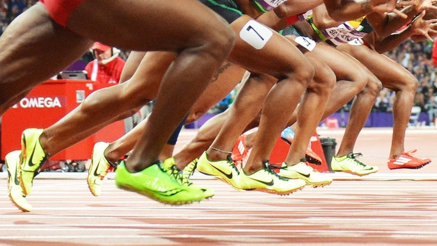 epa03341956 Runners get off the marks at the start of the women&#039;s 100m final during the London 2012 Olympic Games Athletics, Track and Field events at the Olympic Stadium, London, Britain, 04 Aug ...