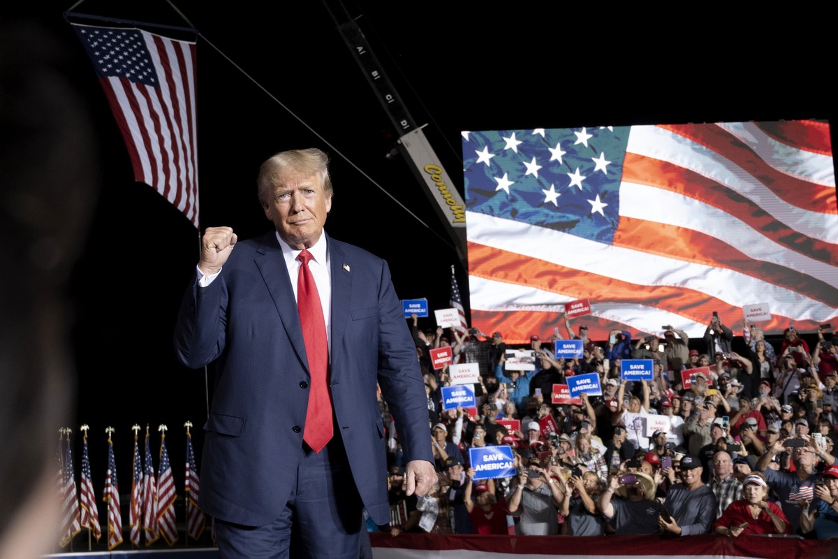 Former President Donald Trump makes his entrance at a rally at the Minden Tahoe Airport in Minden, Nev., Saturday, Oct. 8, 2022. (AP Photo/José Luis Villegas, Pool)