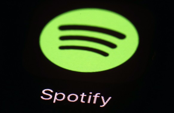 FILE- This March 20, 2018 file photo shows the Spotify app on an iPad in Baltimore. Music site Spotify has complained to European Union regulators about Apple, saying that the U.S. tech giant is abusi ...
