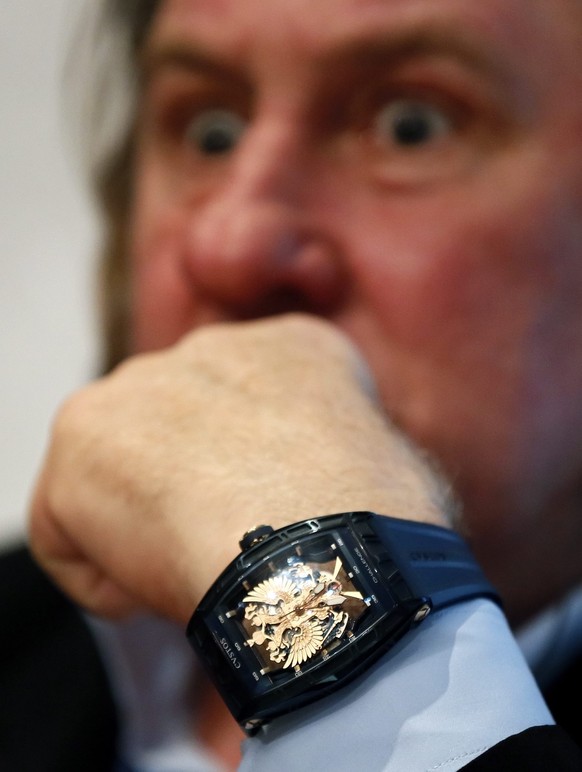epa04532786 French-born actor Gerard Depardieu, who also carries the Russian citizenship since 2013, presents a watch from the series &#039;Proud to be Russian&#039; by Swiss luxury watchmaker Cvstos  ...