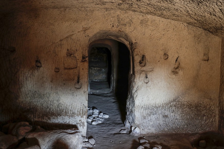 epa10374667 An interior view of a Second Temple-period burial cave in Lachish Forest, 20 December 2022, during excavations on the site of a grave estate from the days of the Second Temple (about 2,000 ...