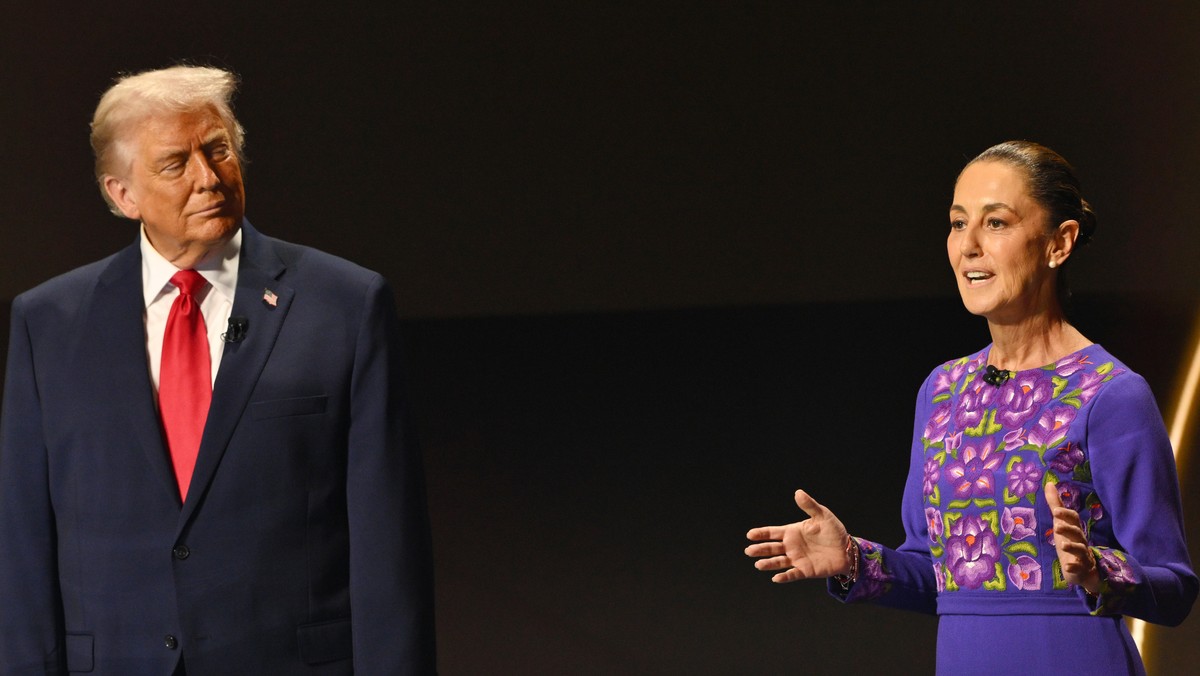 FILE - U.S. President Donald Trump looks on as Mexican President Claudia Sheinbaum speaks on stage at the draw for the 2026 soccer World Cup at the Kennedy Center in Washington, Dec. 5, 2025. (Mandel  ...