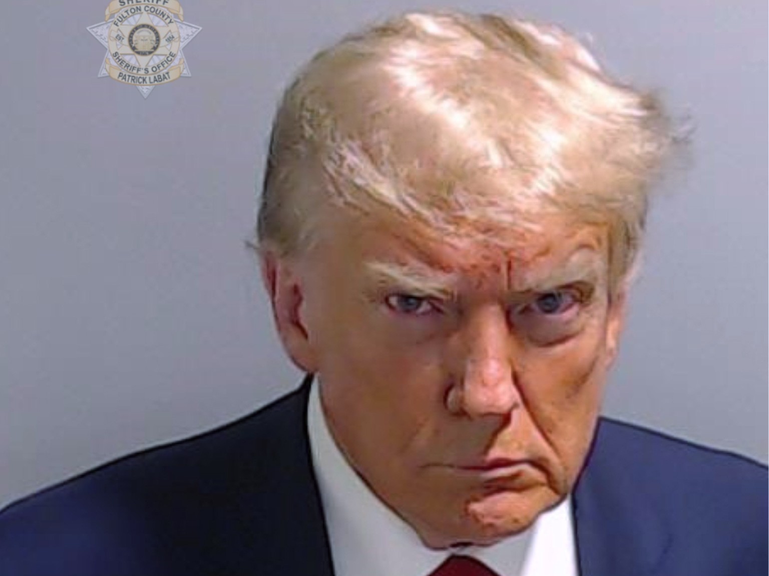 This booking photo provided by the Fulton County Sheriff?s Office shows former President Donald Trump on Thursday, Aug. 24, 2023, after he surrendered and was booked at the Fulton County Jail in Atlan ...