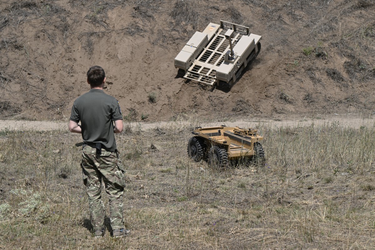 A Ukrainian serviceman from the 93rd Separate Mechanized Brigade controls unmanned ground vehicles on a training ground at an undisclosed location in eastern Ukraine on August 13, 2025, amid the Russi ...