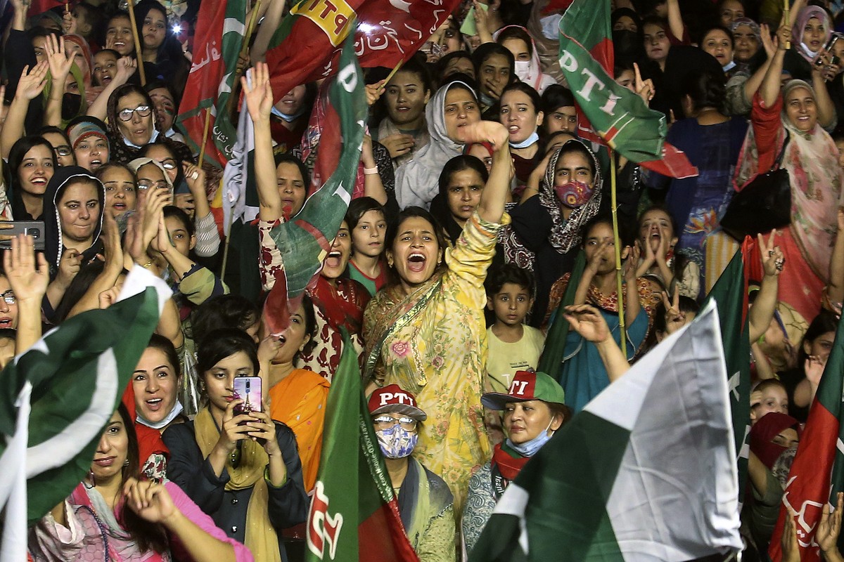 Supporters of deposed Prime Minister Imran Khan's party participate in a rally to condemn the ouster of their leader's government, in Karachi, Pakistan, Sunday, April 10, 2022. With the parl ...