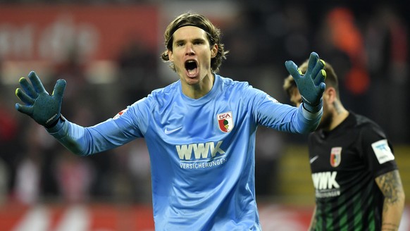 Augsburg goalkeeper Marwin Hitz reacts during the German Bundesliga soccer match between 1. FC Cologne and FC Augsburg in Cologne, Germany, Saturday, Nov. 26, 2016. (AP Photo/Martin Meissner)