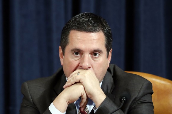 epa08010314 Ranking member Rep. Devin Nunes of Calif., listens as Ambassador Kurt Volker, former special envoy to Ukraine, and Tim Morrison, a former official at the National Security Council, testify ...