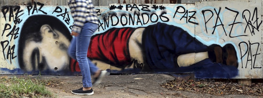 Das Foto des toten Aylan hat eine heftige Debatte ausgelöst – auf der ganzen Welt. Bild: Graffiti in Brasilien.&nbsp;