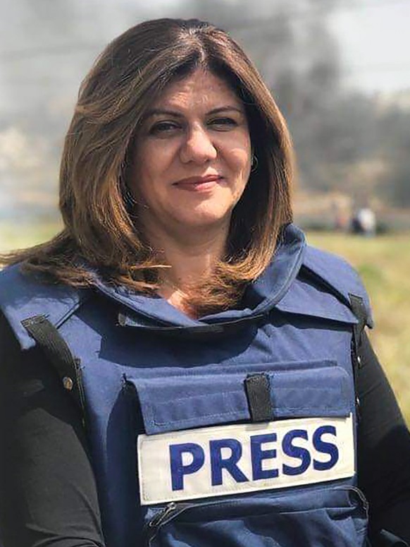 epa09939254 An undated handout photo made available by Al Jazeera network on 11 May 2022 showing Al Jazeera journalist Shireen Abu Akleh. According to the Palestinian health ministry, Al Jazeera journ ...