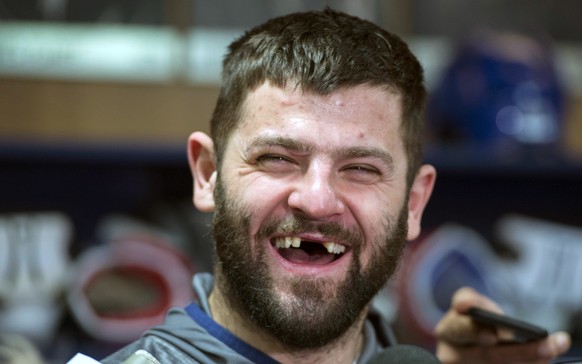 Montreal Canadiens&#039; Alexander Radulov laughs as he talks with reporters in Brossard, Quebec, Monday, April 24, 2017. The Canadiens were eliminated by the New York Rangers in the first round of th ...