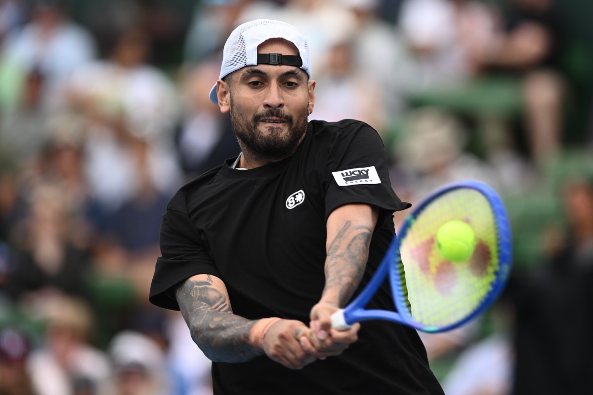 epa12645709 Nick Kyrgios of Australia in action against Zhang Zhizhen of China during the Kooyong Classic tennis tournament in Melbourne, Australia, 13 January 2026. EPA/JOEL CARRETT EDITORIAL USE ONL ...