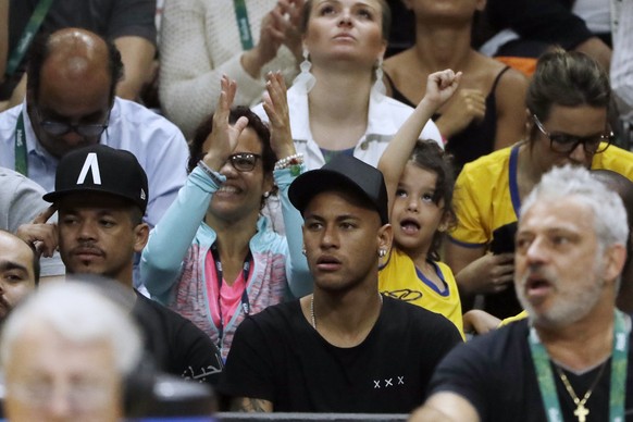 Brazil's Neymar views a men's gold medal volleyball match between Brazil and Italy at the 2016 Summer Olympics in Rio de Janeiro, Brazil, Sunday, Aug. 21, 2016. (AP Photo/Matt Rourke)