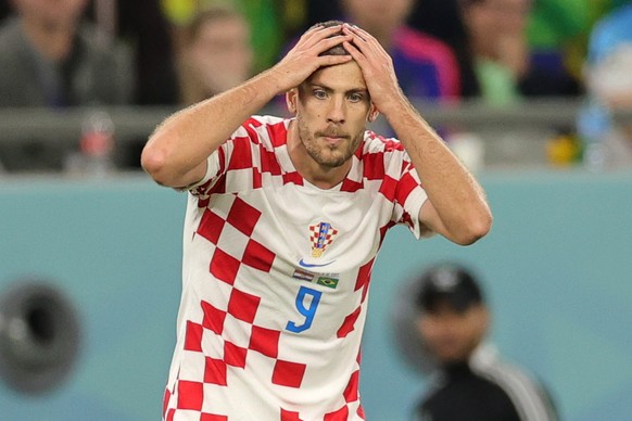 epa10357248 Andrej Kramaric of Croatia reacts during the FIFA World Cup 2022 quarter final soccer match between Croatia and Brazil at Education City Stadium in Doha, Qatar, 09 December 2022. EPA/Fried ...