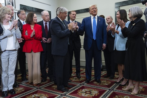 Republican presidential candidate former President Donald Trump arrives to speak with reporters at the National Republican Senatorial Committee, Thursday, June 13, 2024, in Washington. (AP Photo/Evan  ...